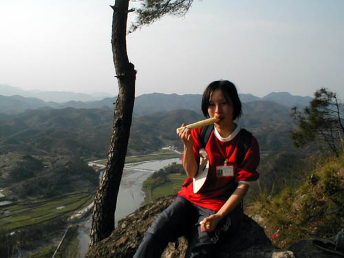 Aya talking with some bamboo