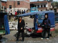 Judy with local taxi