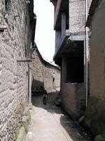 Village street with tiny kid