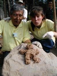 Mud man with parents